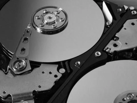 Detail from an opened hard disk Stock Photos