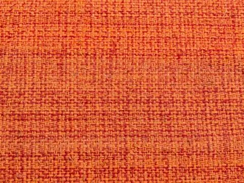 Detail of Padroes of red orange fabric Close up Detail of patterns of rude... Stock Photos