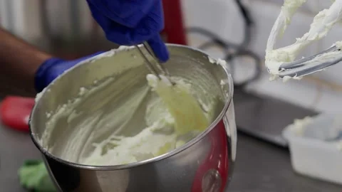 Detail of a pastry chef manually making a lemon cream. Stock Footage 171818055