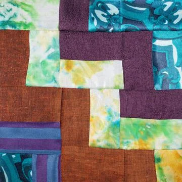Detail of patchwork cloth from various fabrics Stock Photos