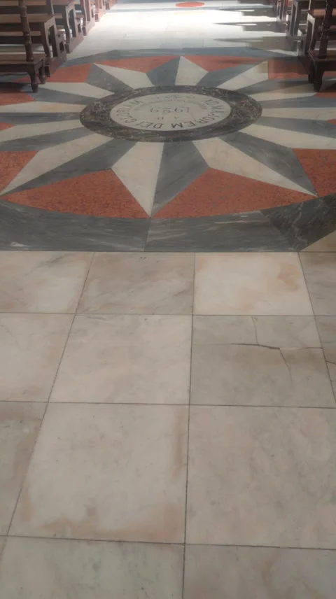 Detail of the polychrome marble floor with geometric star inlay inside Stock Footage 344545041