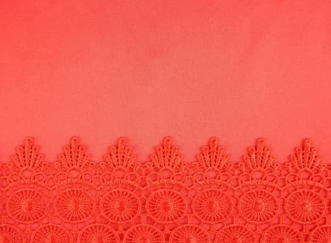 Detail of red lace pattern fabric 스톡 사진