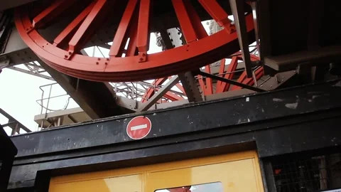 Detail of the Rotating Elevator Wheel and Cables in Eiffel Tower France Stock Footage 99518039
