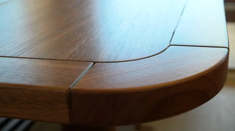 Detail of rounded corner of a table Stock Footage 58659906