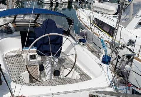 Detail of rudder and navigation instruments on a sailboat Stock Photos
