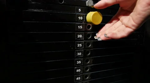 Detail of setting leg press weights in gym at training Video stock 48445753