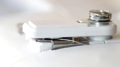 Detail on sewing machine Stock Footage 127240458