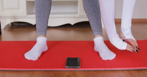 Detail shot Smartphone With Video Tutorial is on the Floor. Healthy Girl Stock Footage 128544959