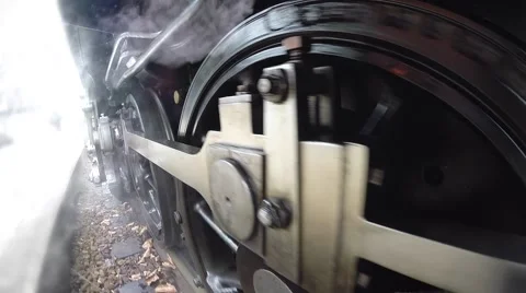 Detail shot of spinning steam engine wheels. motion moving background Stock Footage 43619086