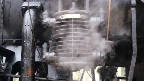 Detail shot of steam train engine with smoke. Black train composition, waiting Stock Footage 243754294