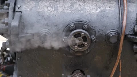 Detail shot of steam train engine with smoke. Black train composition, waiting Stock Footage 243754348
