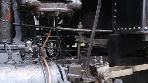 Detail shot of steam train engine with smoke. Black train composition, waiting Stock Footage 243754664