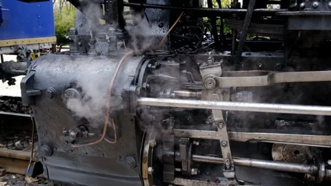 Detail shot of steam train engine with smoke. Black train composition, waiting Stock Footage 243764155