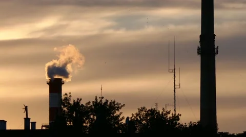 Detail of silhouette factory producing pollution, smoke - global warming concept Stock Footage