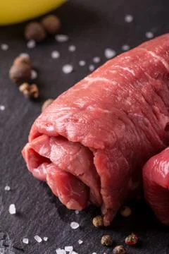 Detail of single beef slice rolled and prepared for roulade Stock Photos