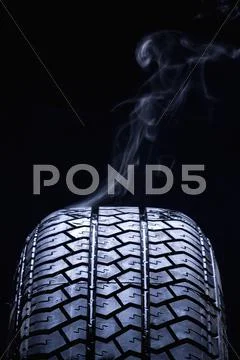 Detail Of Smoke Coming From A Car Tire
