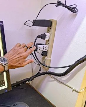 Detail of a socket in use. Stock Photos