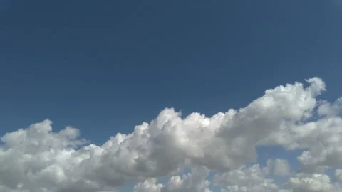 Detail of some white clouds and the blue sky Stock Footage 132575111