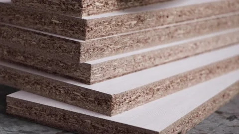 Detail of stack of laser cut white melamine boards Stock Footage 149333628