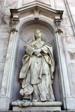 Detail of a stone statue of a saint Stock-Fotos