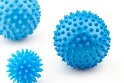 Detail studio shot of three different blue rubber massage balls isolated on Stock Photos