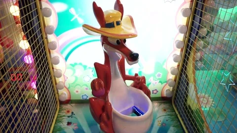 Detail Throwing Ball into Kangaroo machine Game Stock Footage 140174700