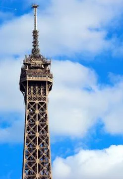 Detail of the tip of the Eiffel Tower that soars in the Paris France Stock Photos