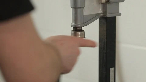 Detail of a tool for closing or bottling beer bottles. Stock Footage 113523923
