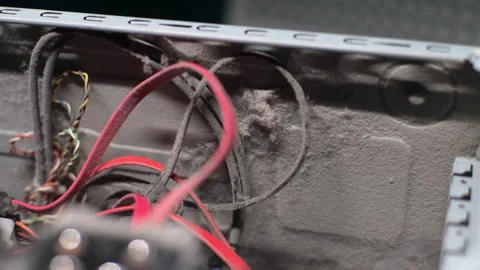 Detail tracking shot of dust layer inside of old system unit. Close-up of dirty Stock Footage 277228041