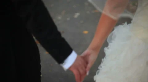 Detail of two lovers joining hands Stock Footage 40831832