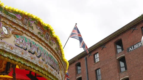 Detail of the upper part of a carousel, on which the British flag is anchored. Stock Footage 304885821