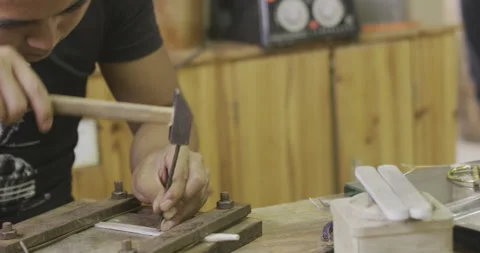 Detail using hammer on tool board Stock Footage 141362484