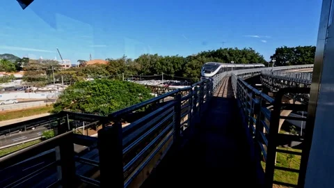 Detail view of the automated running on the elevated tracks of Line 17-Gold Video stock 344355111