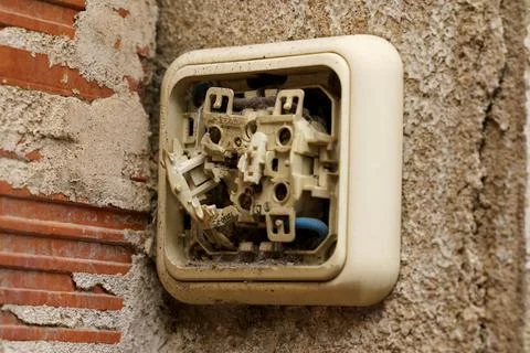 Detail view of a broken electrical switch. Foto stock