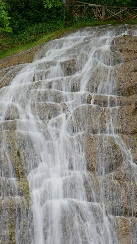 Detail view of waterfall in vertical format. Silk effect.Long exposure. Stock Footage 288985732