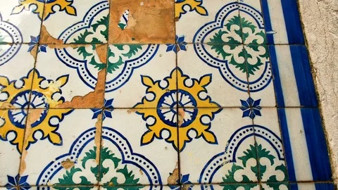 Detail of a wall covered with Azulejo, a typical ornament of Portuguese Video stock 107933260