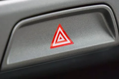 Detail of a warning button in a car Stock Photos