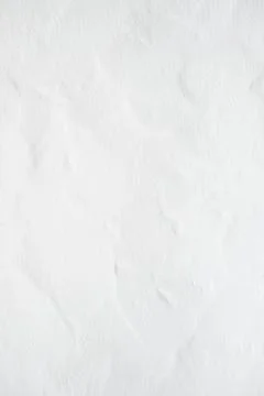 Detail of white plaster wall Stock Photos