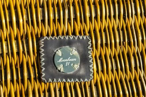  Detail of wicker hamper with leather patch indicating that the hamper bel... Stock Photos