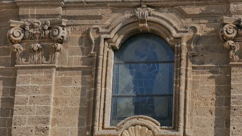 Detail of window on the faade of Saint Joseph church in Nard, Italy. Video stock 89769102