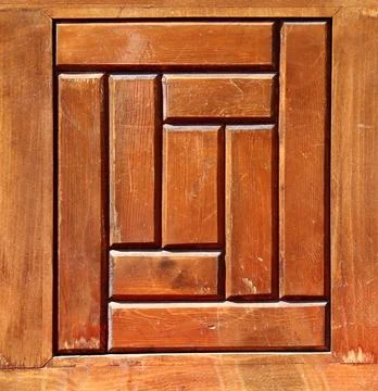 Detail of window shutter with square elements and beautiful wooden texture Stock Photos