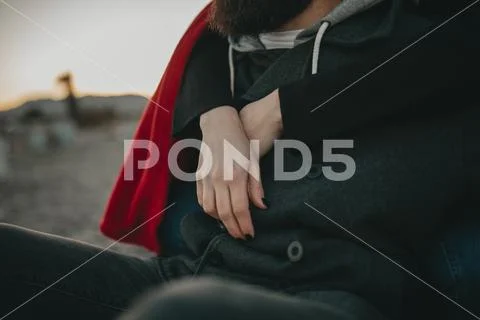 Detail of woman hands while embraces her boyfriend. Stock Photos