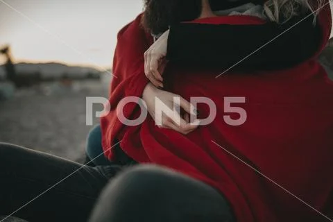 Detail of woman hands while embraces her boyfriend. Stock Photos