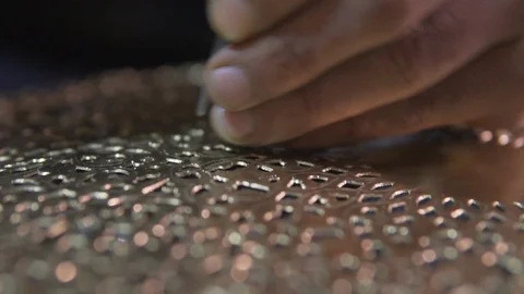 Detail working Souk Marrakech hands hammer crafting  typical marocaine lantern Stock Footage 87459604