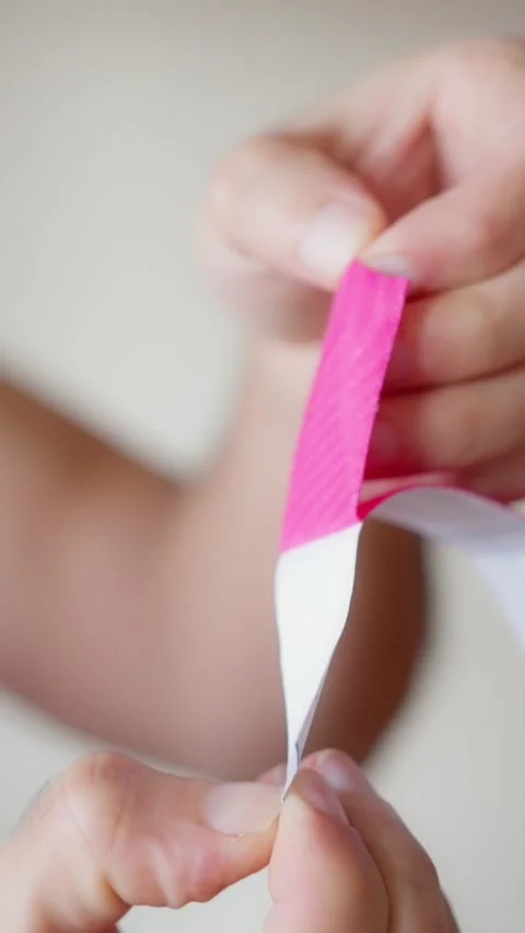 A Detailed and Comprehensive Guide to Applying Kinesiology Tape StepbyStep for Stock Footage 308370361