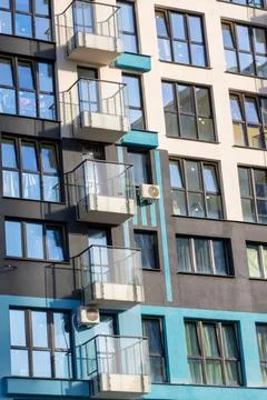 Detailed architectural pattern. Geometric balcony pattern with cooling units and Stock Photos