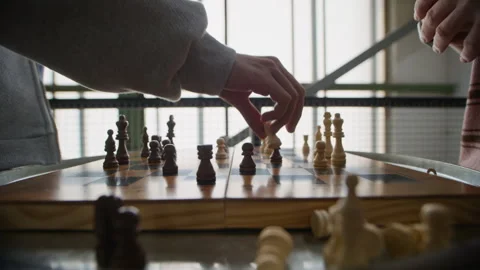 Detailed Chess Gameplay with Focus on Board and Pieces Stock Footage 332778698