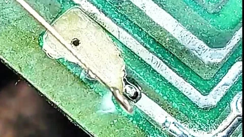 Detailed Circuit Board Restoration Using Jumper Wire Technique Stock Footage 333553006