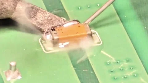Detailed Circuit Board Restoration Using Jumper Wire Technique Stock Footage 333553014