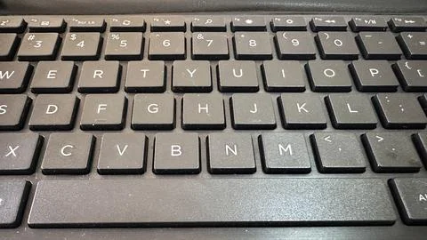 A detailed close-up of a black computer keyboard with visible keys Stock Photos